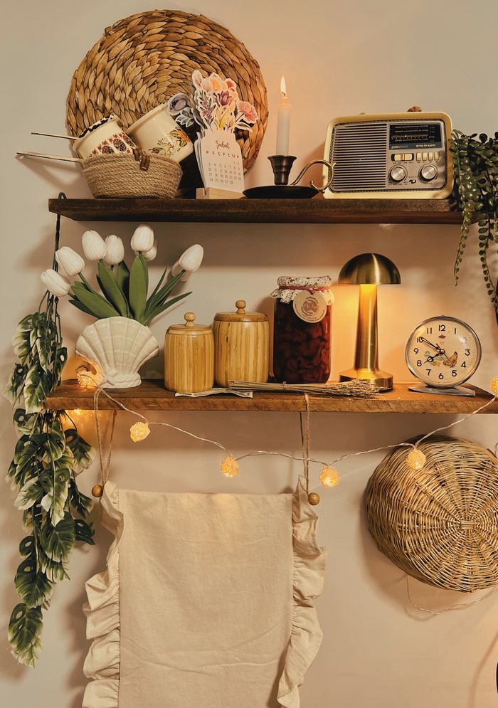 About Warm vintage kitchen shelf featuring rustic decor, lights, and floral elements.